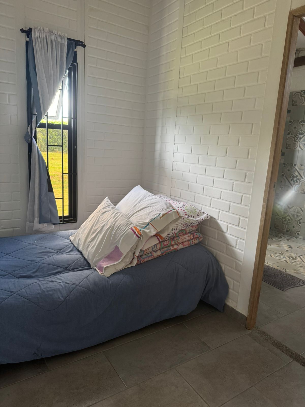 Habitación con vista al jardín